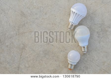 LED Bulbs are on the white concrete