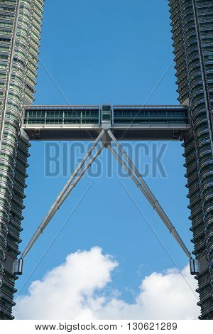 KUALA LUMPUR MALAYSIA - FEBRUARY 29: Close up view of skybridge of Petronas Twin Towers on February 29 2016 in Kuala Lumpur Malaysia. A skybridge connects the two towers.