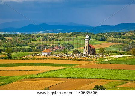 Church and graveyard on picturesque landscape region of Prigorje Croatia