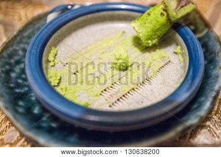Japanese green horse radish in a wasabi bowl