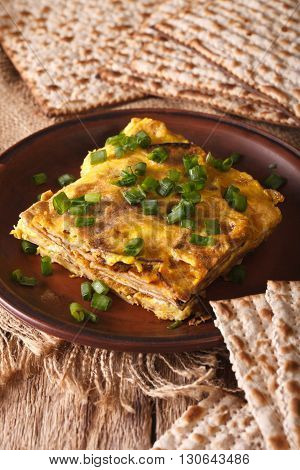 Jewish Cuisine: Matzah Brei With Green Onions Close-up. Vertical