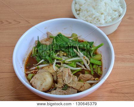 pork ball in brown soup eat with rice