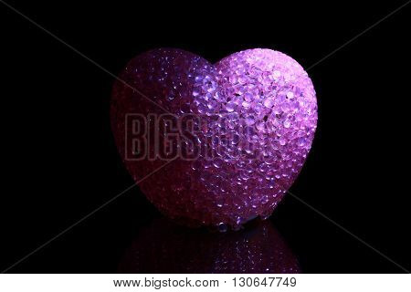 Pink love heart in black background dark