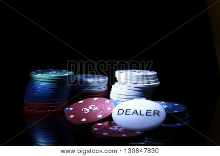 gambling chips on the black background casino
