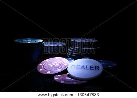gambling chips on the black background casino