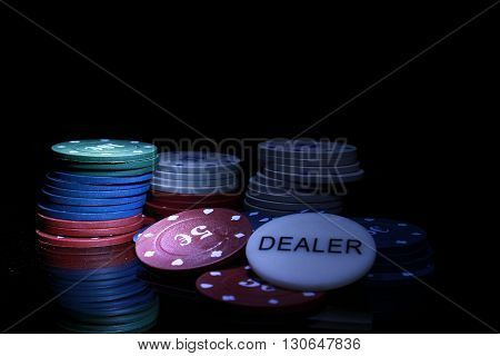 gambling chips on the black background casino
