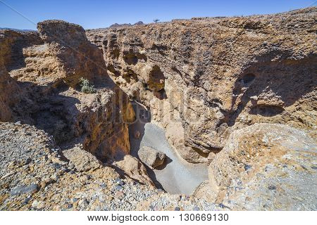 View of Sesriem Canyon near Sossusvlei in the Namib-Naukluft National Park of Namibia