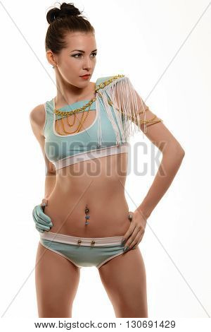 Sexy go-go dancer in studio on a white background.
