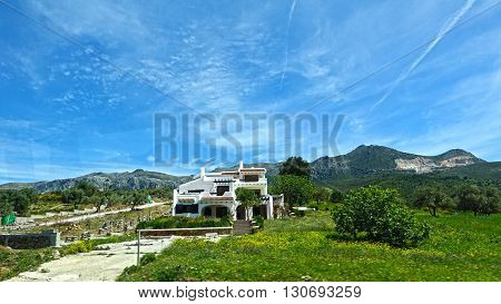 A beautiful house in a picturesque plains.