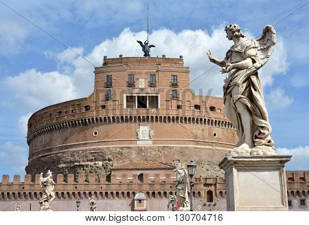 Sant'Angelo castle and bridge with beautiful baroque angels among clouds in the center of Rome