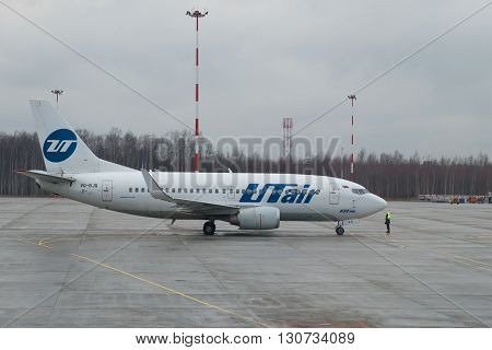 SAINT PETERSBURG, RUSSIA - DECEMBER 12, 2015: A Boeing 737-500 (VQ-BJQ) UTair airline on the tarmac at the airport Pulkovo