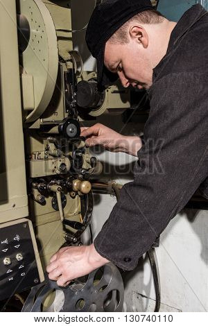 Projectionist At Work In The Room