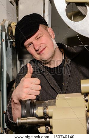 Projectionist At Work In The Room