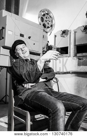 Projectionist At Work In The Room