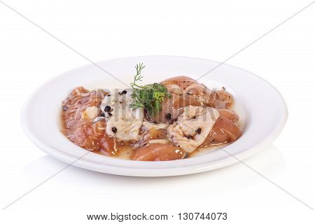 Raw Marinated Chicken With Black Pepper Isolated On White Background