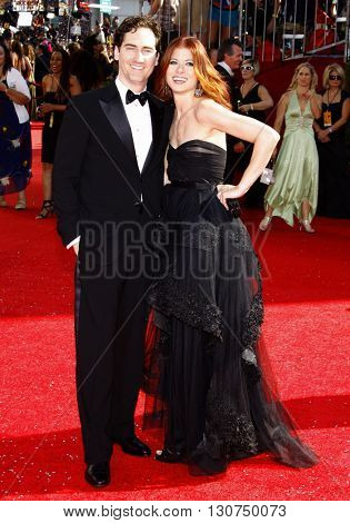 Daniel Zelman and Debra Messing at the 60th Primetime Emmy Awards held at the Nokia Theater in Los Angeles, USA on September 21, 2008.