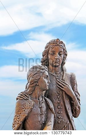 MUKACHEVE, UKRAINE - MAY 10, 2013: Monument to the widow of Prince Francis I Rakoczi Ilona Zrinyi and young Francis II Rakocz, Palanok Castle or Mukachevo Castle, Zakarpattya, Ukraine, built in 14th century