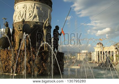 Macedonia Skopje detail of the Alexander the Great monument-fountain Macedonian national flag in the background