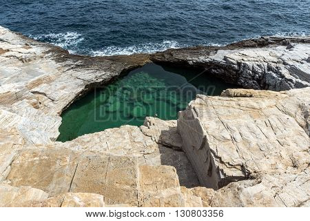 Green waters of Giola Natural Pool in Thassos island, East Macedonia and Thrace, Greece