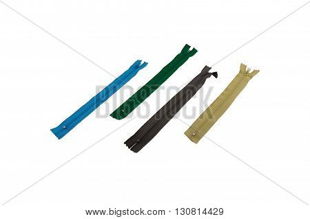 macro four multi-colored zipper locks of a fastener isolate on a white background