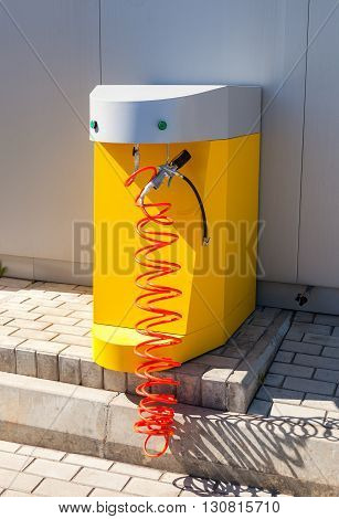 SAMARA RUSSIA - MAY 14 2016: Air pump at the Rosneft gas station in summer sunny day. Rosneft is one of the largest russian oil companies and gas stations