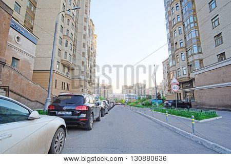 Moscow, Russia - May, 11, 2016:  cars on a parking in an inhabited district in Moscow, Russia