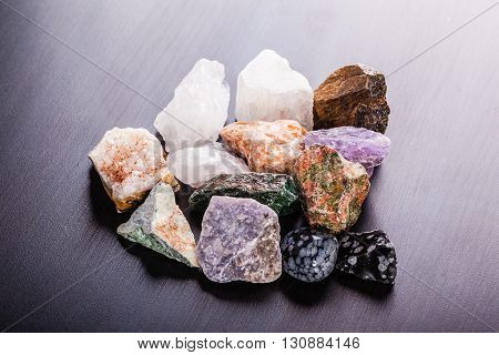 Heap Of Semi-precious Minerals On Wood