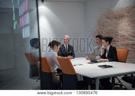 business people group brainstorming on meeting and businessman presenting ideas and projects oon laptop and tablet computer