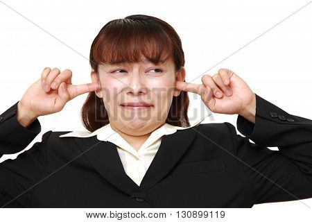 Asian businesswoman suffers from noise on white background