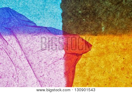 abstract composition made with colorful tissue paper to enfatize textures and colors