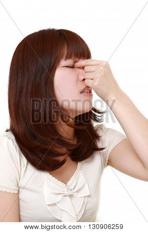 portrait of woman suffers from Asthenopia on white background