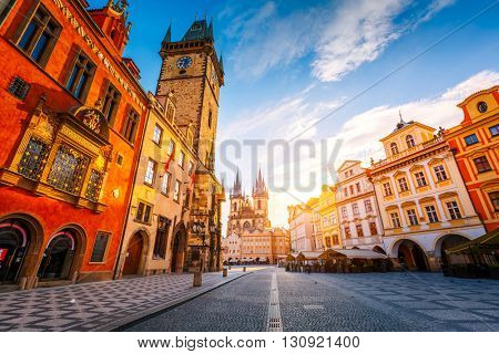 Fantastic view of the town Hall and Temple of Our Lady before Tyn in sunlight at dawn. Dramatic scene. Location famous place (unesco heritage) square on Prague, Czech Republic, Europe. Beauty world.