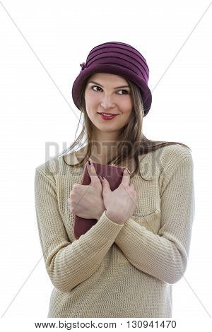Portrait of a young wman with a wallet looking up left isolated against a white background.