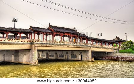 Traditional-style bridge abouve a canal in Suzhou, China