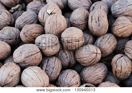 A big group of whole walnuts together