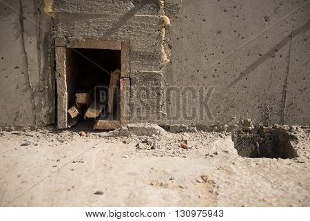 Pipes aperture in the concrete wall and in the floor