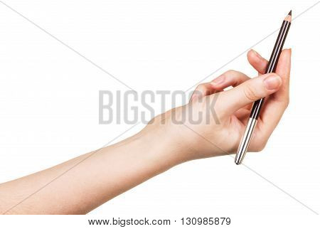 Eyebrow Pencil in a female hand isolated on white background.