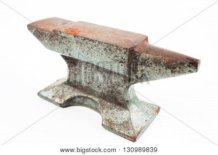 Old rusty rugged anvil foundry isolated white background.