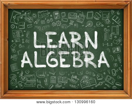 Learn Algebra - Handwritten Inscription by Chalk on Green Chalkboard with Doodle Icons Around. Modern Style with Doodle Design Icons. Learn Algebra on Background of  Green Chalkboard with Wood Border