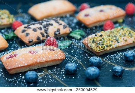 Vegan Cakes Decorated With Mint And Berries. Product Photography For Patisserie.