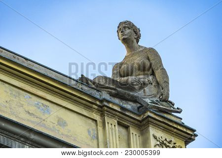 Sculptures On The Roof Of Arena Del Sole Theatre In Bologna, Italy. This Historc Theatre Was Built I