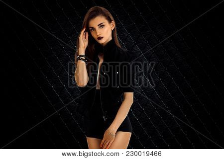 Young Beautiful Woman In Panties And Jacket Looking At The Camera Isolated On White Background