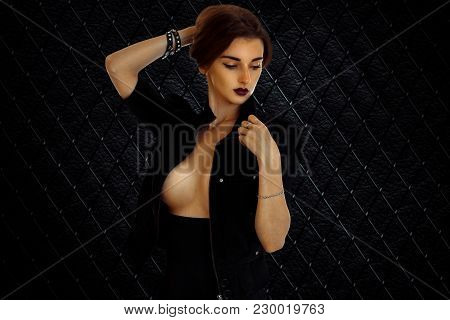 Young Glamour Topless Girl In Black Jacket With Big Natural Breasts Looking Down Isolated On White B