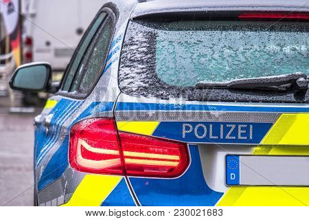 Polizei Is The German Word For Police - Here Written On The Back Of The Police Car.