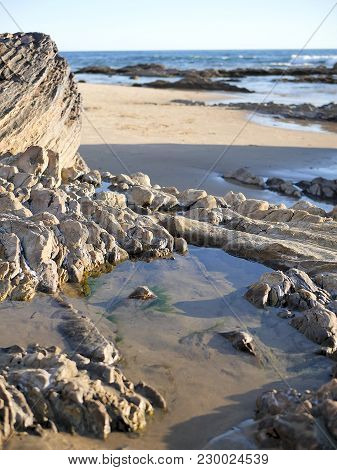 California Beach With Waves, Tidepools, Blue Green Water And Rocks On Shore. Great For Travel Blogs,