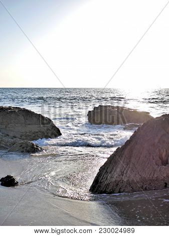 California Beach With Waves, Tidepools, Blue Green Water And Rocks On Shore. Great For Travel Blogs,