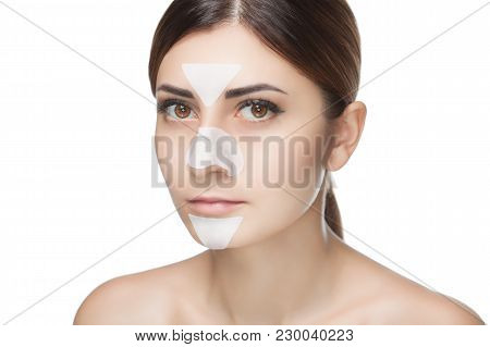 Portrait Of A Beautiful Girl With A Mask From Acne On The Nose And T-zone.