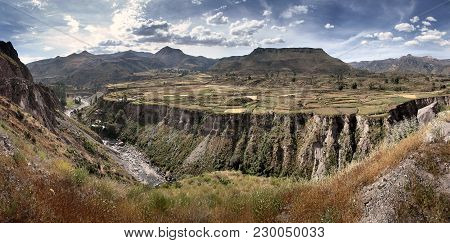The Colca Canyon In Peru In Arequipa Departement - View Of Terraced Fields And Colca River
