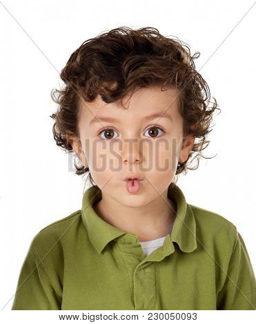 Funny child doing a grin puting his lips together isolated on white background