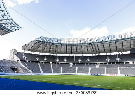 Berlin, Germany - September 20, 2017: Green Grass Pitch And Empty Tribunes Of Olympiastadion (olympi